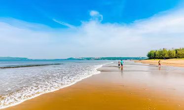 Miramar Beach Stroll along the scenic coastline with a cabs in North Goa Plan your trip today